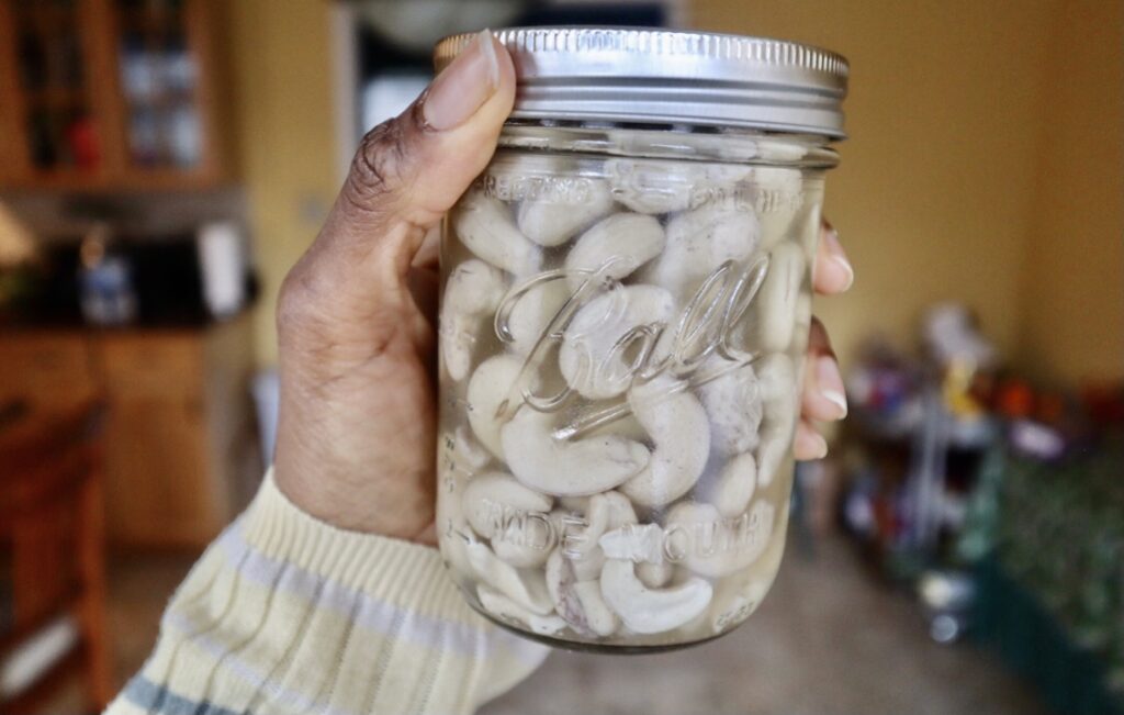 cashews soaking in water glass mason jar