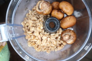 walnuts and mushrooms in a food processor