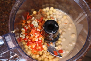 Hummus ingredients in food processor 