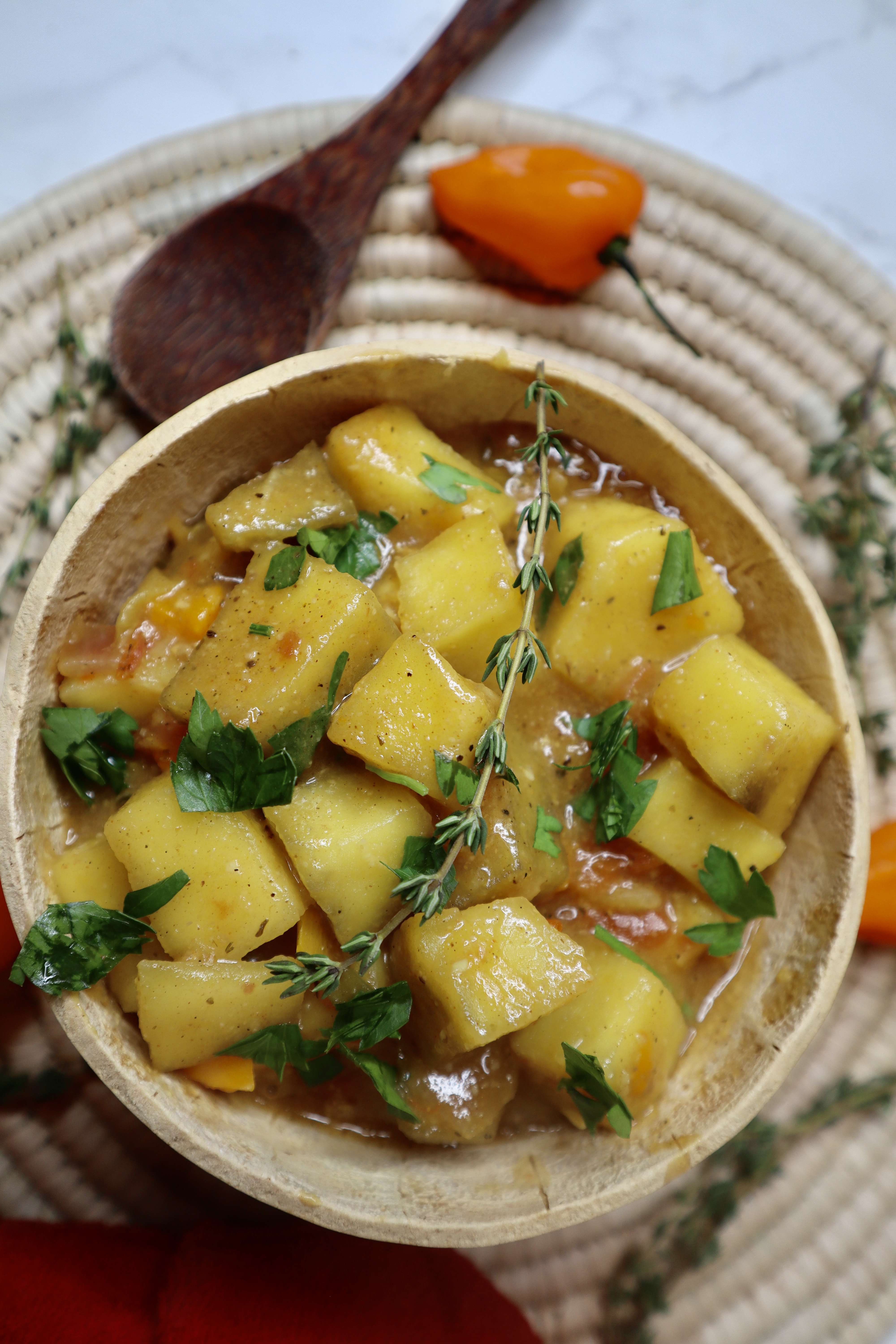 Jamaican yellow yam stew in calabash bowl