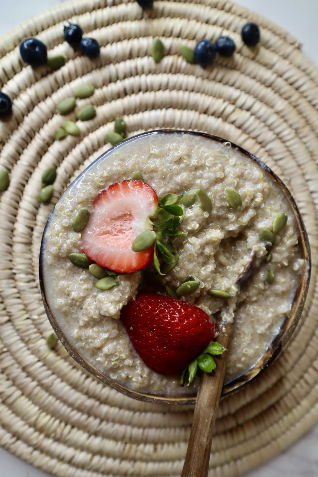 quinoa porridge topped with strawberries