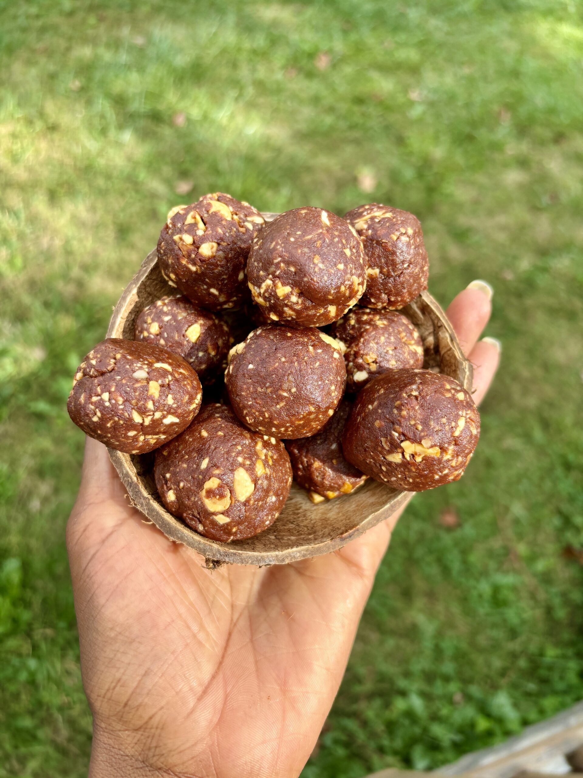 Snickers Energy Balls in coconut bowl