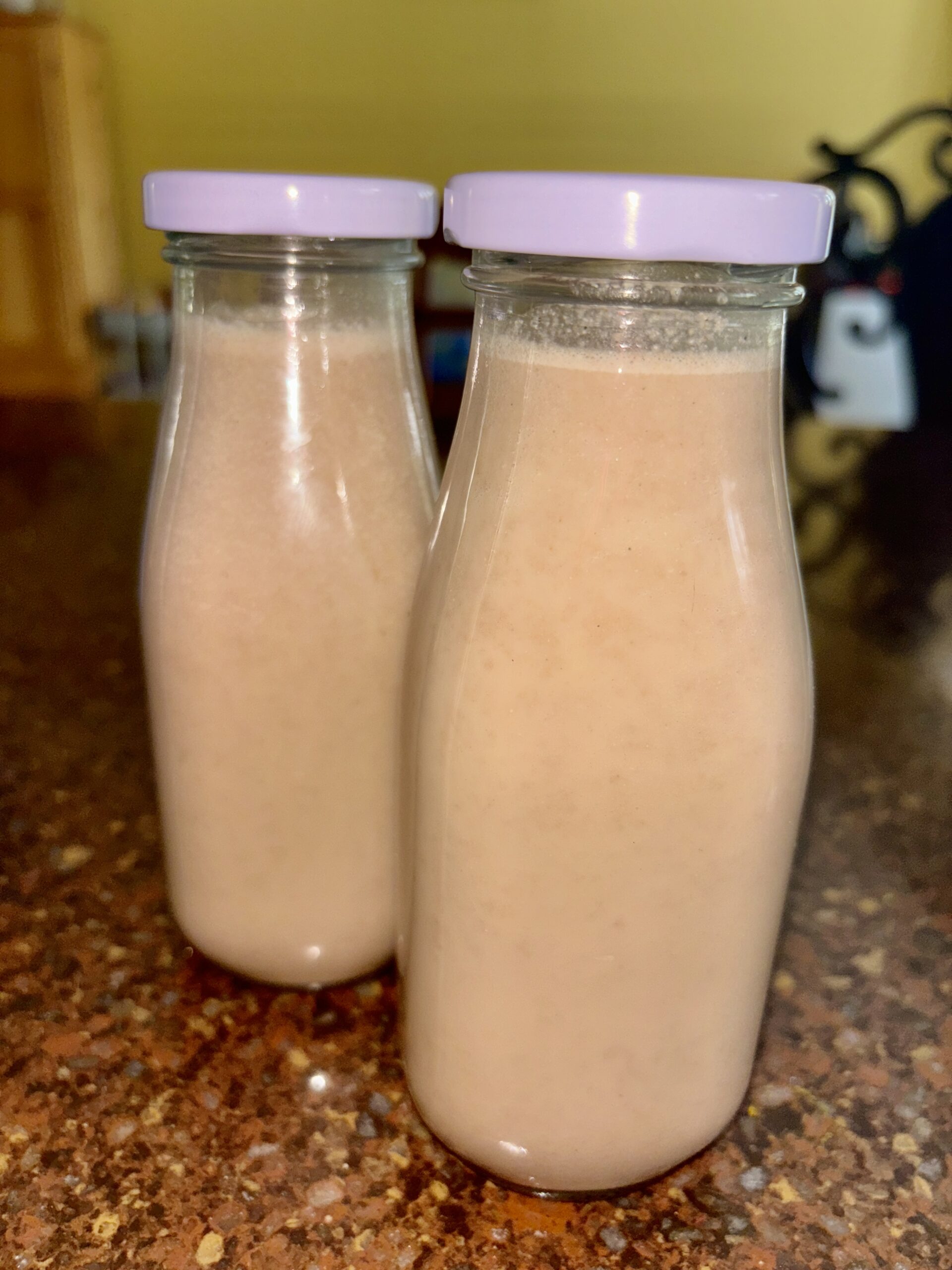 homemade Jamaican milo recipe in 2 small milk bottles