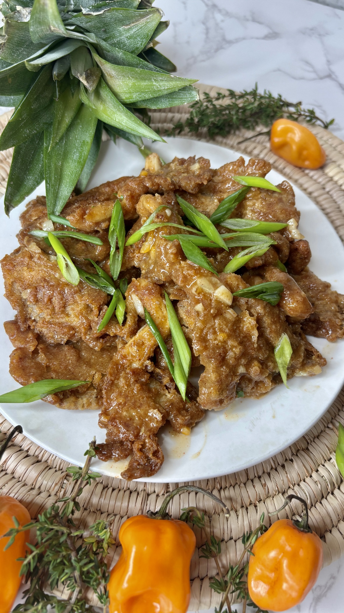 pineapple habanero wings topped with scallion