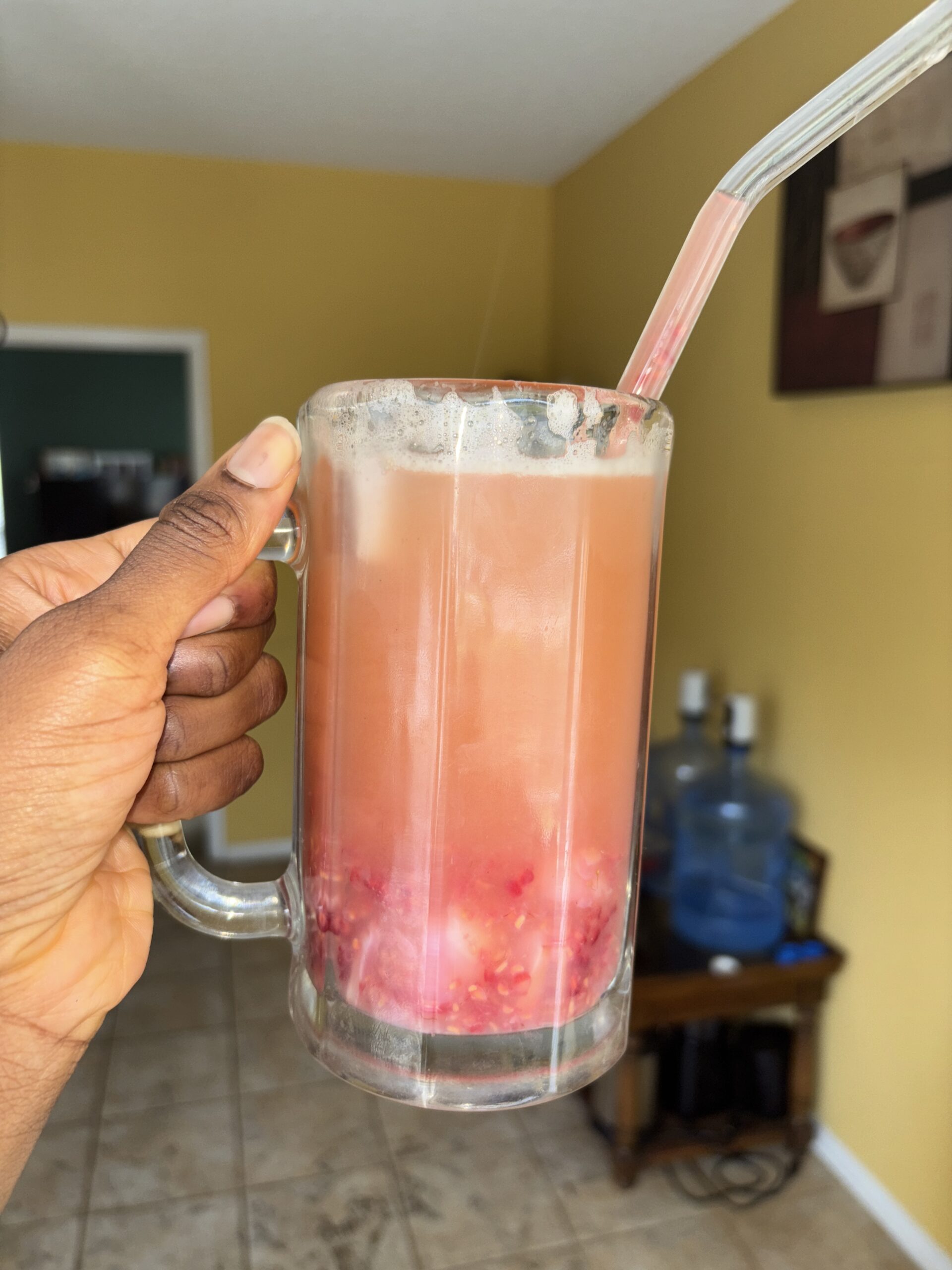womb healthy iced tea in a large glass with a straw
