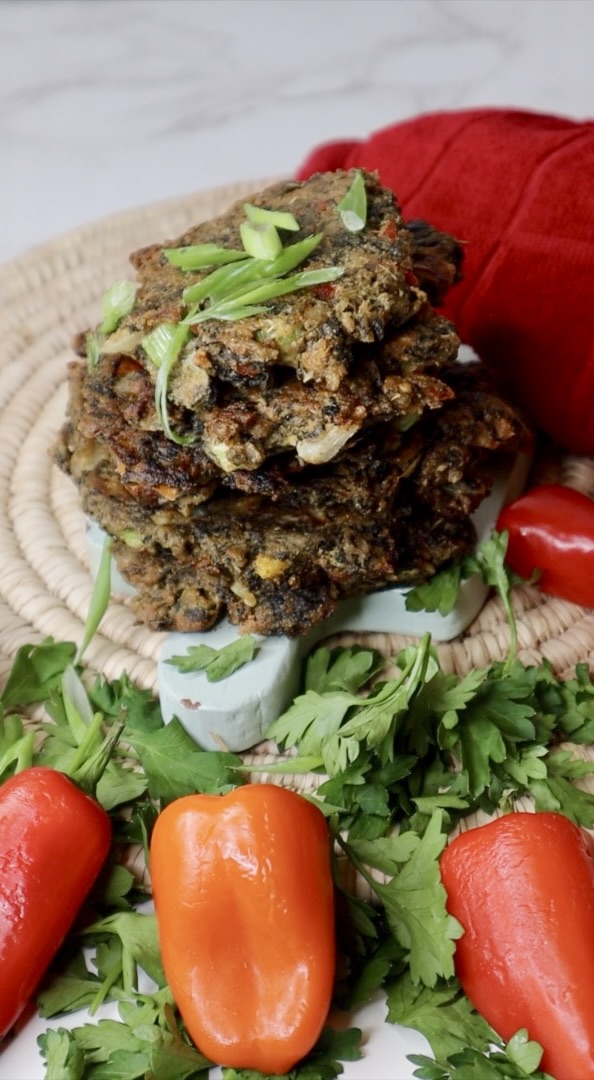 jamaican callaloo fritters topped with scallion