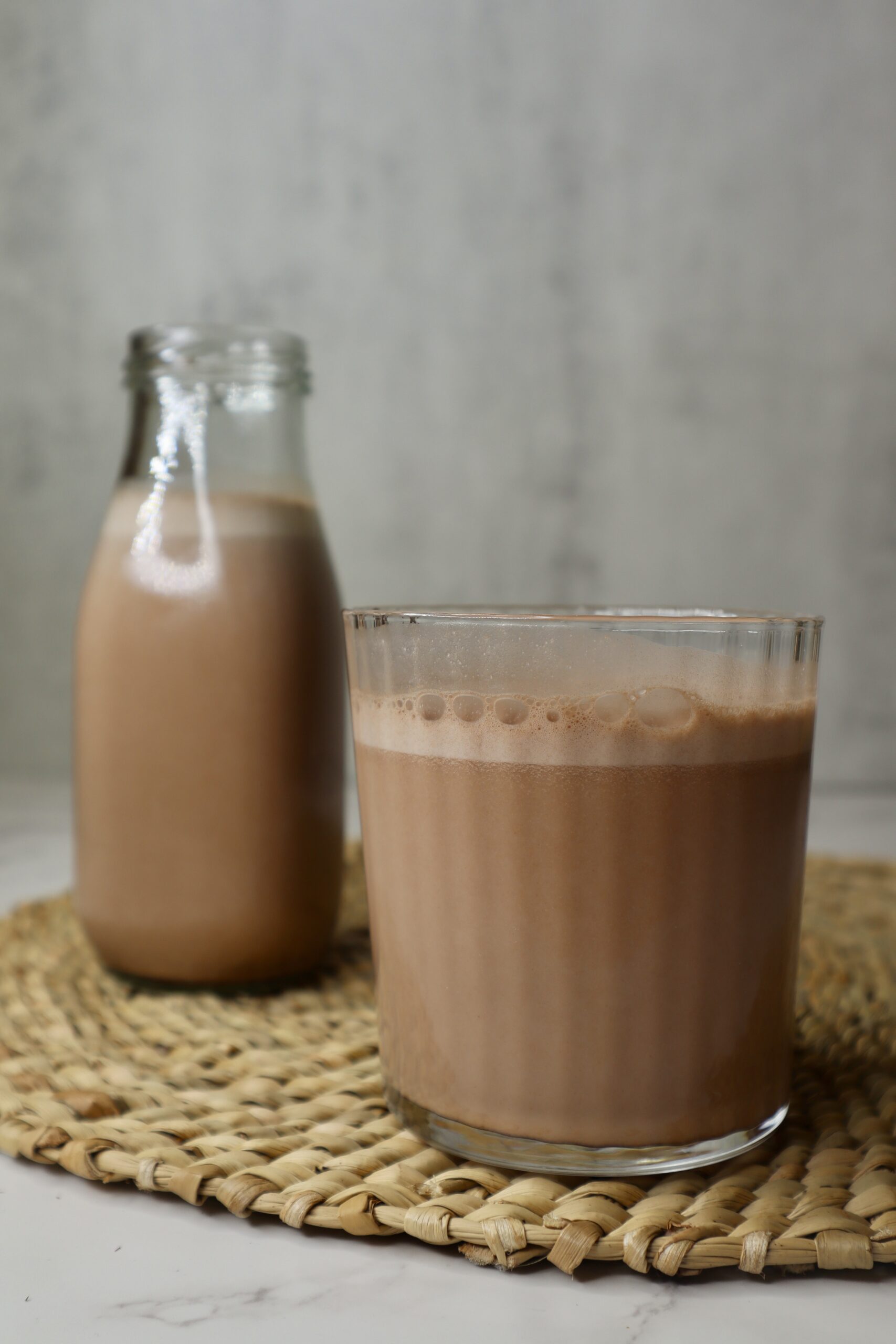 two glasses of homemade chocolate milk
